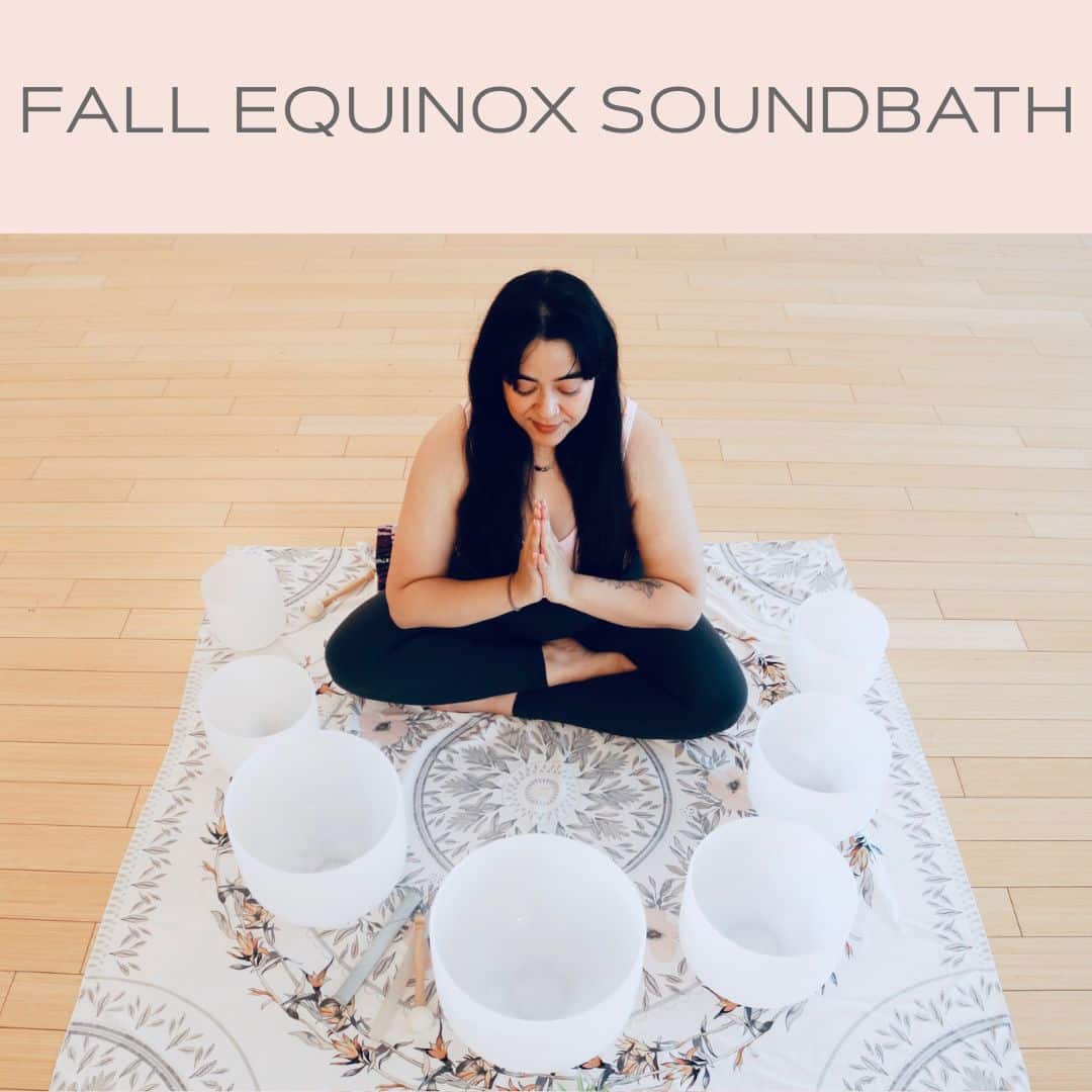 girl with prayer hands in front of crystal sound bowls