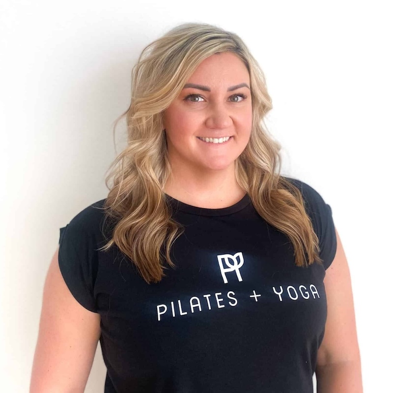 Kim Tuthill, owner of Pilates + Yoga, a las vegas boutique woman owned business Pilates and yoga studio